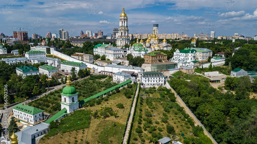 Aerial top view of Kiev Pechersk Lavra churches on hills from above, Kyiv city, Ukraine
