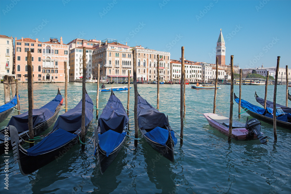 VENICE, ITALY - MARCH 13, 2014: Canal grande and gondolas for church Santa Maria della Salute.