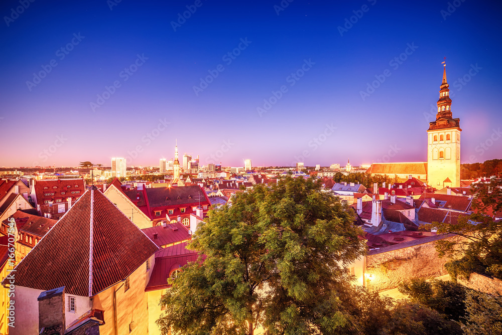 Tallinn, Estonia: aerial top view of the old town at night
