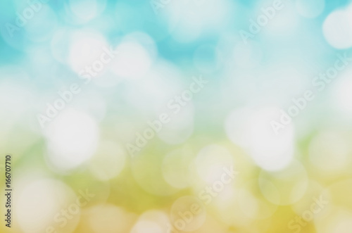 Blue and yellow with bokeh blurred abstract background.
