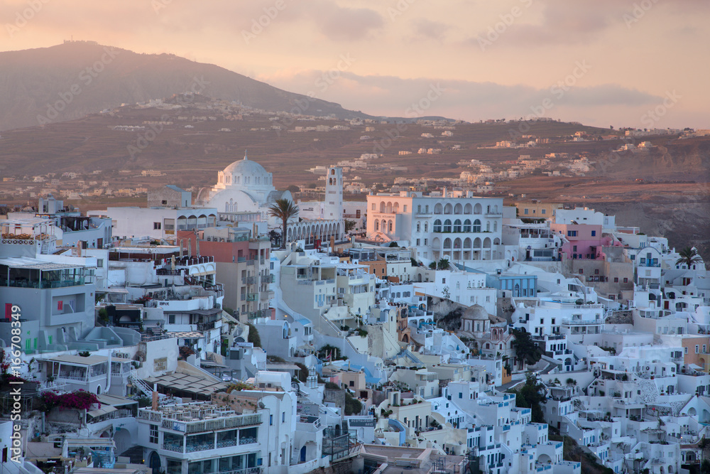 SANTORINI, GREECE - OCTOBER 5, 2015: The Fira at morning dusk from Firostefani