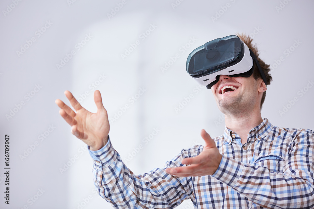 Man using virtual reality headset Man using virtual reality headset
