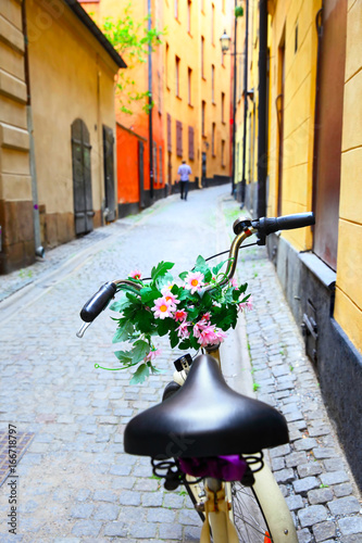 Photography Bicycle with flowers on handle bar in Stockholm
