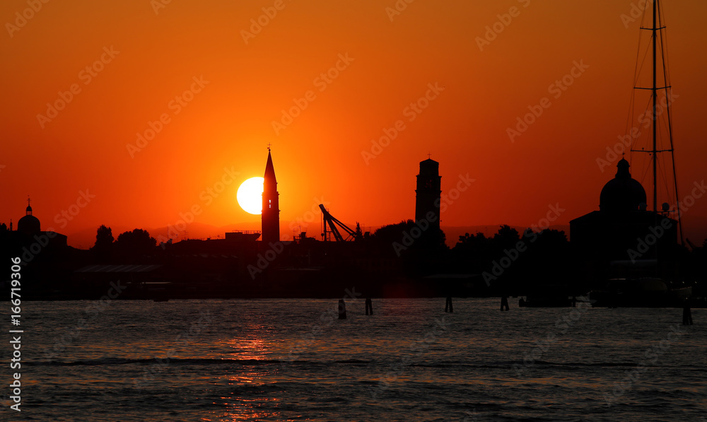 sunset in VENICE in Italy and the shape of the churches
