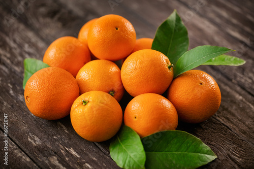 Healthy raw orange fruits background many orange fruits.