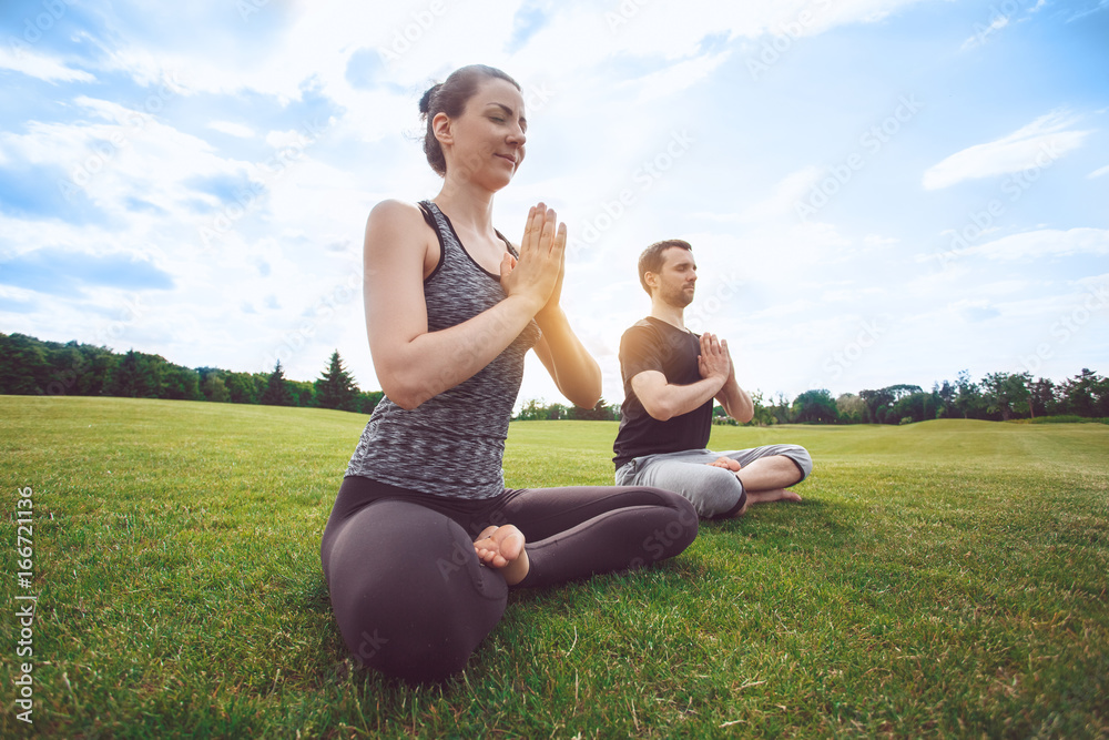People practice acro yoga outdoors healthy lifestyle People practice acro yoga outdoors healthy lifestyle