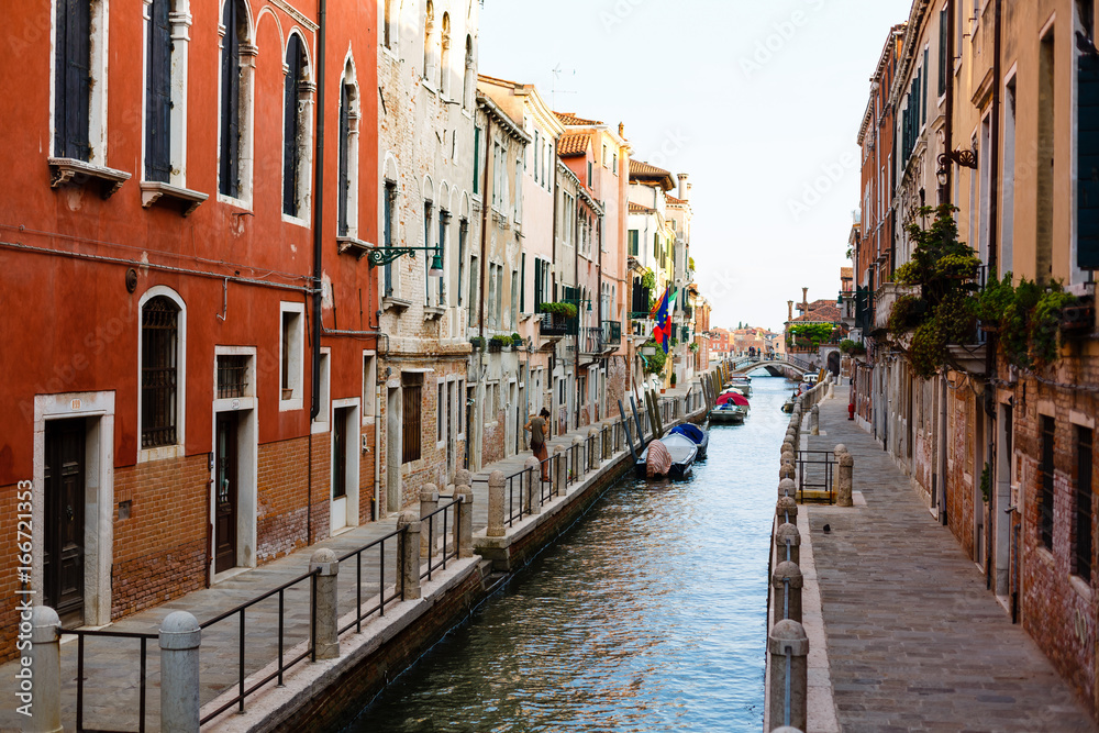 Narrow canals are famous and typical in Venice.