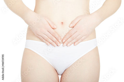 Young woman with menstrual cycle pain isolated on white, clipping path © andersphoto