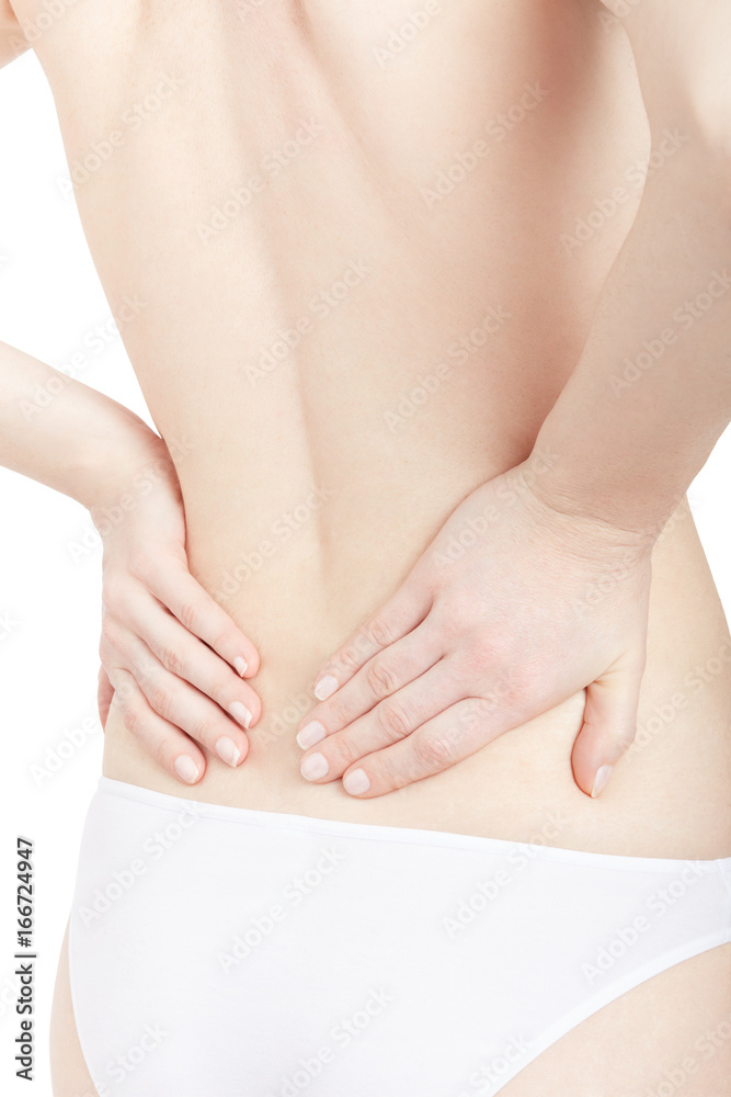 Young woman suffering from pain in lower back isolated on white, clipping path