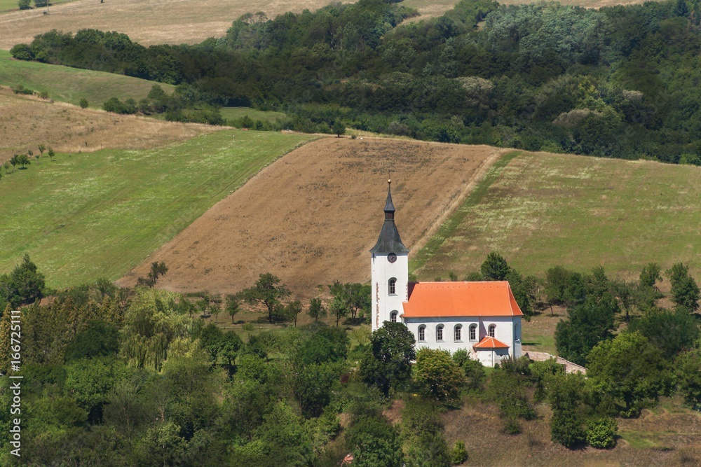 Lonely church in a rural landscape. Faith in God. Country life.