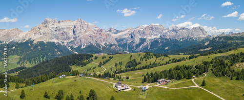 Fantastic landscape on the Dolomites. Drone aerial view on the peaks called Sas Crusc, Lavarela, Conturines and Pizes de Fanis. Place is Alta Badia, Sud Tirol, Italy photo