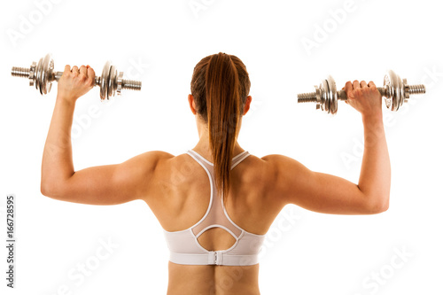 Active young sporty hispanic woman workout with dumbbells isolated