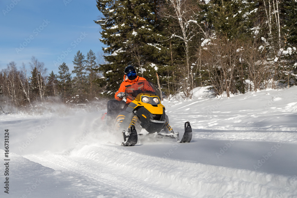 Athlete on a snowmobile