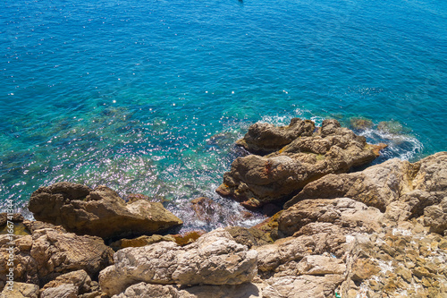 Cliff by the clear water in Nice city