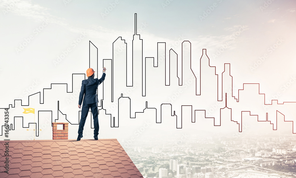Man architect draw silhouette of modern city on blue sky. Mixed Man architect draw silhouette of modern city on blue sky. Mixed