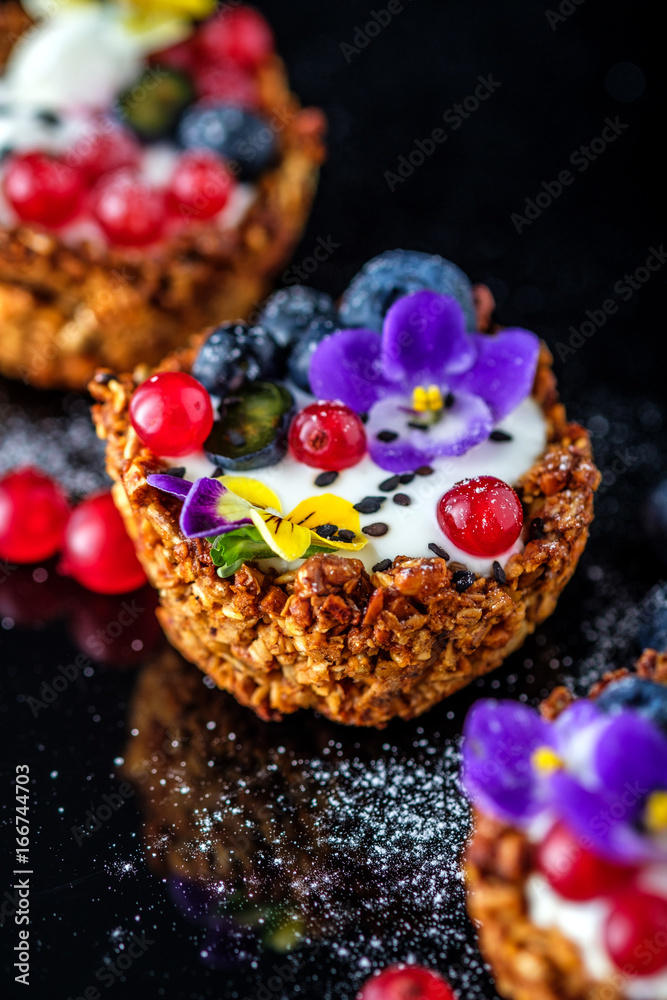 Dessert with sunflower seeds, yogurt and fresh berries