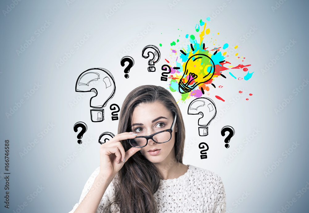 Young woman taking off glasses, idea and questions Young woman taking off glasses, idea and questions