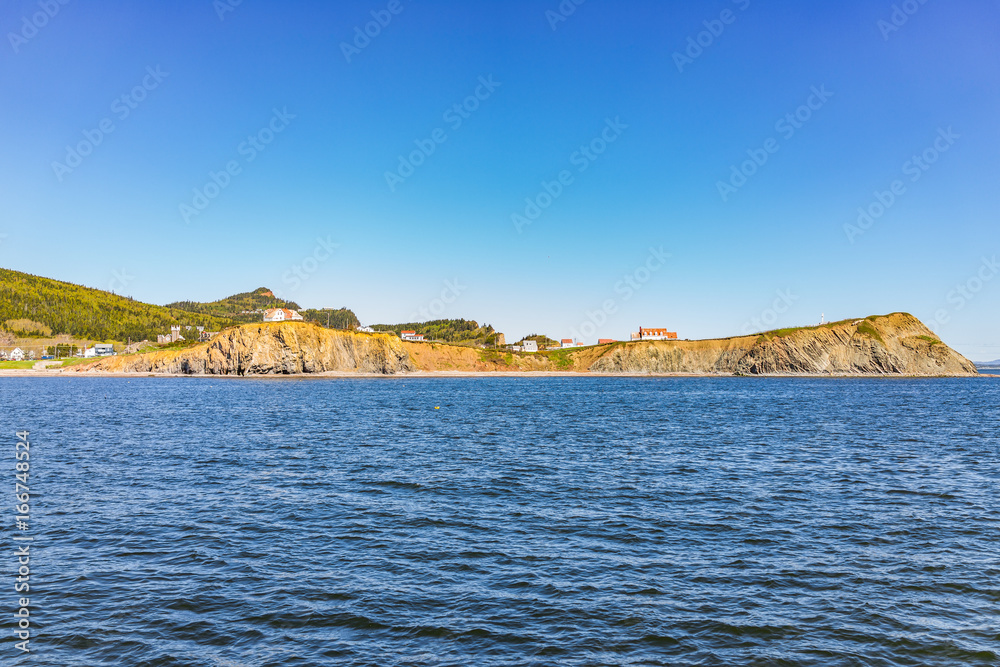 Panorama cityscape of Perce in Gaspe Peninsula, Quebec, Gaspesie region with cliffs in morning