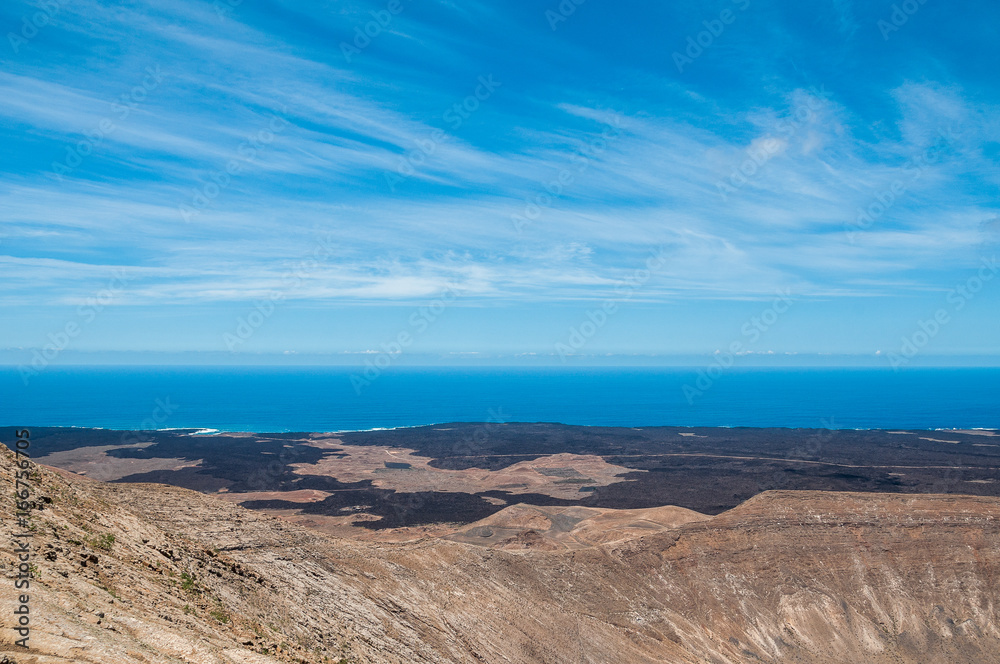 Non - active volcanoes and lava flows along coastline, Lanzarote, Canary Islands