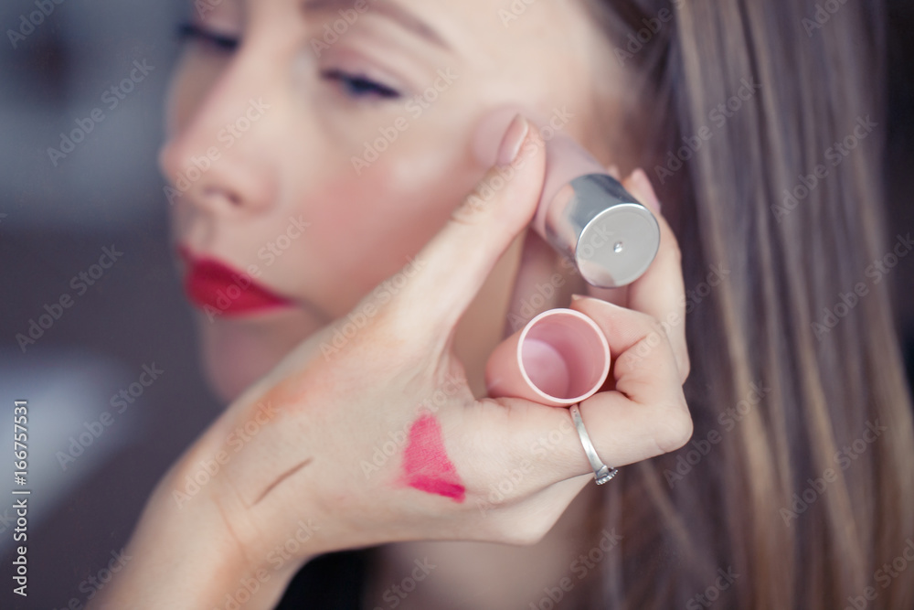 Fototapeta premium Hand of makeup artist