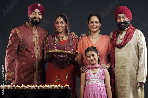 Portrait of a Sikh family with diyas  photo