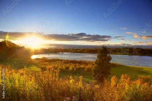 Photography Sunset over river in autumn