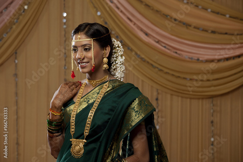 Pretty young bride smiling  photo