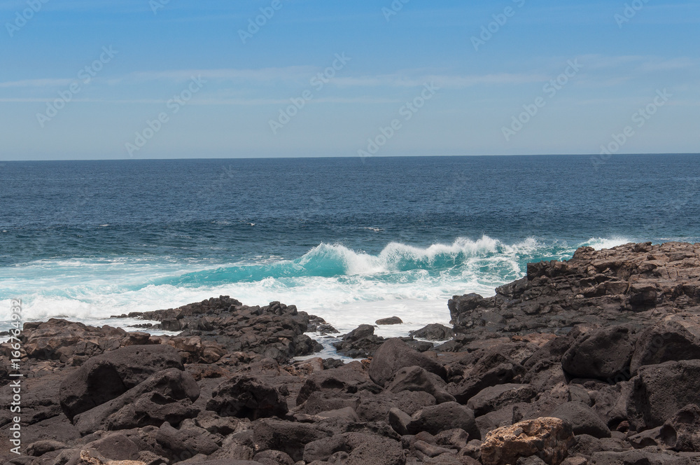 Oceanic waves against the Boca de Abaco volcanic rocks coast, Lanzarote, Canary Island
