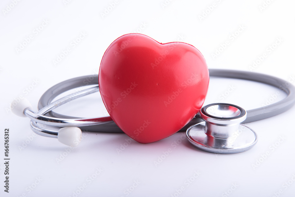 Red heart and a stethoscope isolated on white background Red heart and a stethoscope isolated on white background