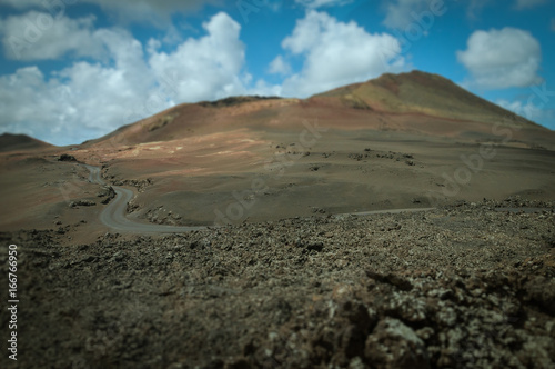 Tilt shift effect of road at the foot of ancient volcano, Lanzarote, Canary Island