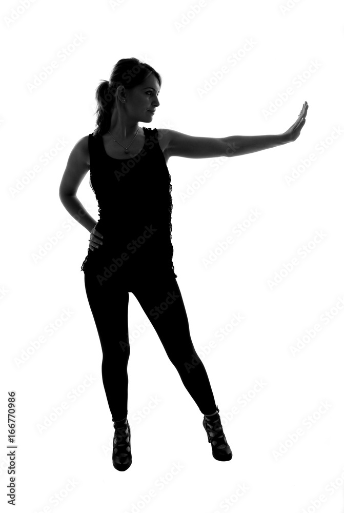 stylish silhouette of caucasian woman posin