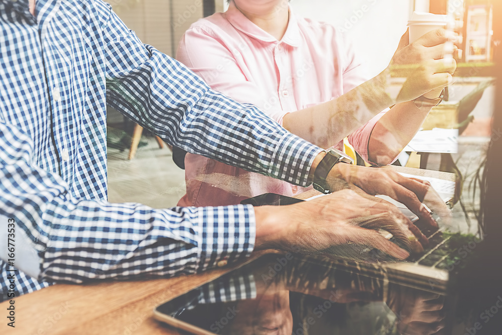 Fototapeta premium Start up partners are working in casual clothes, discussing the ideas for new strategy of development.