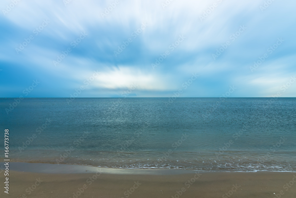 Quiet blue sea with motion cloud. Quiet blue sea with motion cloud.