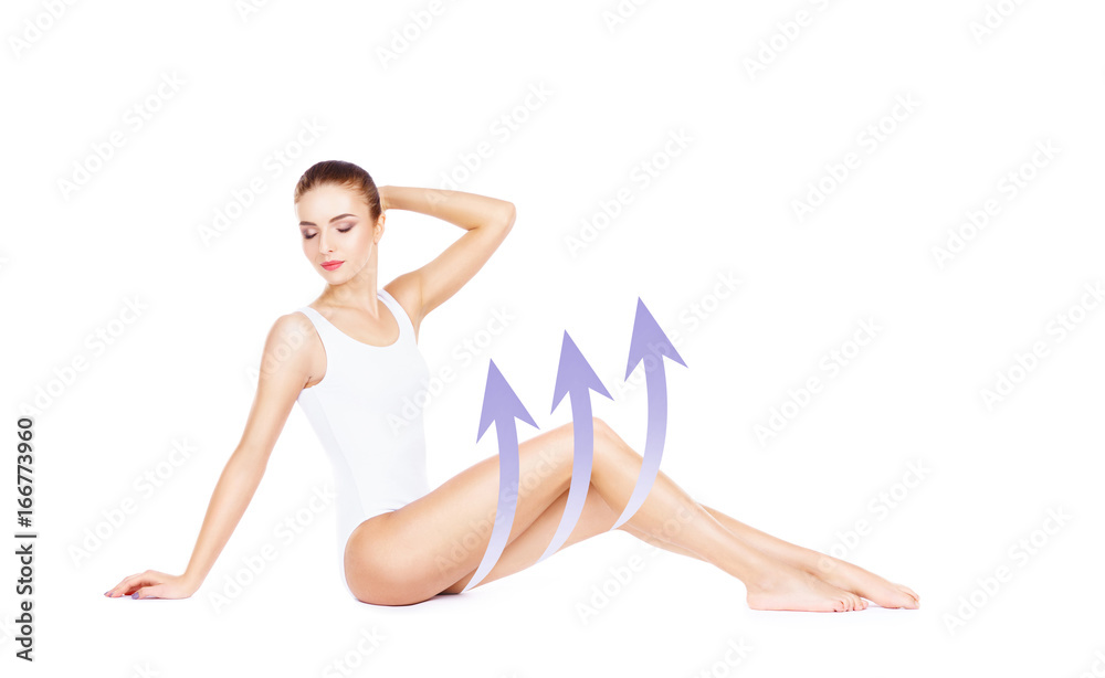 Beautiful fit girl posing on isolated background with drawing arrows. Health, sport, fitness, nutrition, epilation, cellulite and hair removal, liposuction, healthy life-style concept. Beautiful fit girl posing on isolated background with drawing arrows. Health, sport, fitness, nutrition, epilation, cellulite and hair removal, liposuction, healthy life-style concept.