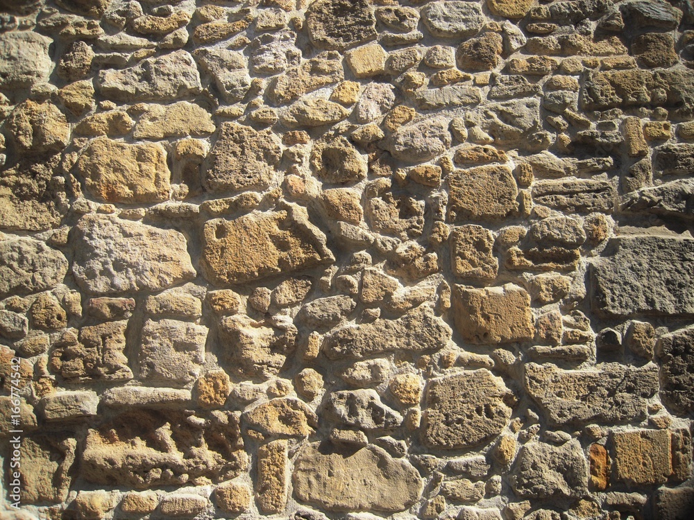 Ancient stone wall, antique masonry, natural background. Ancient stone wall, antique masonry, natural background.