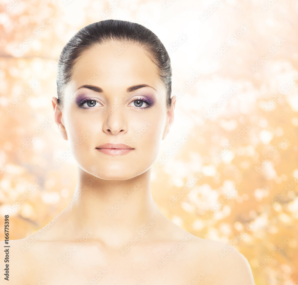 Portrait of young, natural and healthy woman over yellow autumn background. Healthcare, spa, makeup and face lifting concept. Portrait of young, natural and healthy woman over yellow autumn background. Healthcare, spa, makeup and face lifting concept.