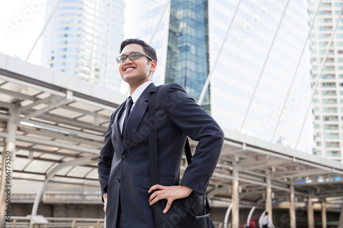 Wallpaper Mural Young asian businessman outdoors Torontodigital.ca