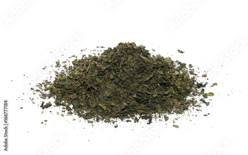 Dry cut nettle pile, isolated on white background