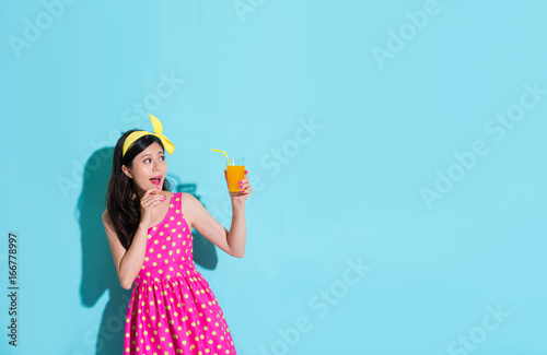 happy woman looking at summer fresh orange juice © PR Image Factory