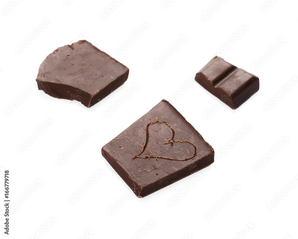 Chocolate bars with carved heart isolated on white background Chocolate bars with carved heart isolated on white background