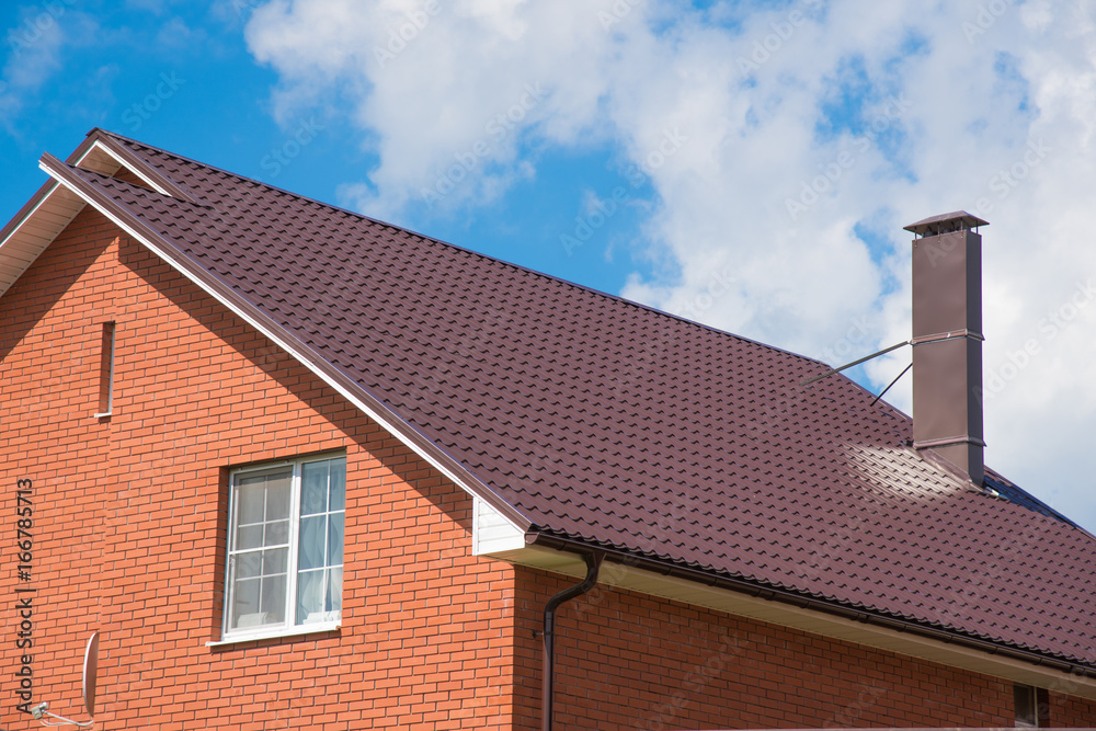 house with a gable roof window