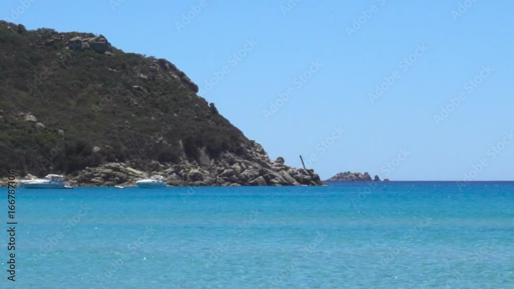 White Wild Mediterranean Sea Beach in Italy with Clear Blue Water and Promontory White Wild Mediterranean Sea Beach in Italy with Clear Blue Water and Promontory