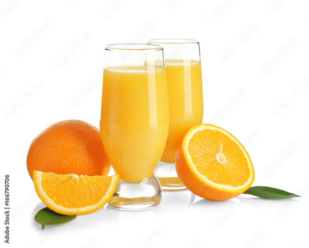 Composition with glasses of fresh juice and oranges on white background Composition with glasses of fresh juice and oranges on white background