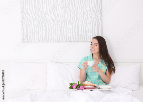 Beautiful young woman havin...