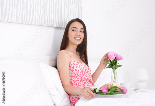 Beautiful young woman havin...