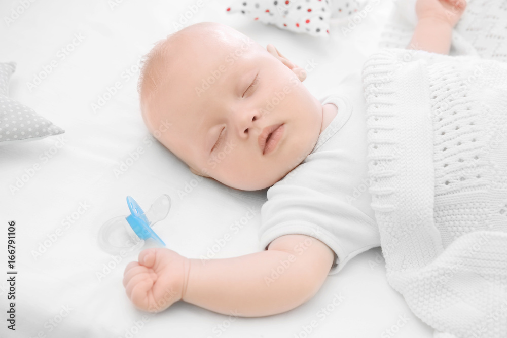 Adorable baby sleeping in cradle at home Adorable baby sleeping in cradle at home