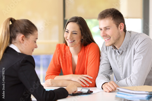 Employee calculating budget for customers photo