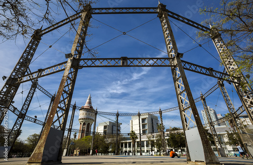 Gas holder in a public park in the Barcelona district Barceloneta. The Gasometer serves today as a playground and Basketball field. The gas holder is located in a small green area.
