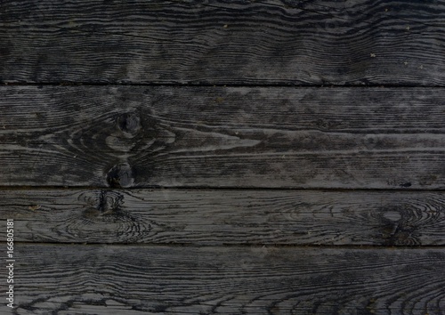 Dark wooden boards, planks....
