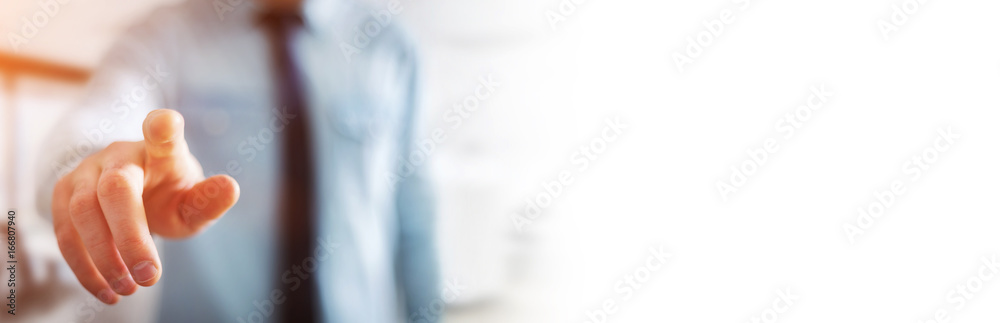 Obraz premium Panorama view of businessman pointing finger